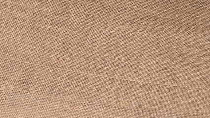 Fototapeta premium Close-up of fabric woven from burlap. Burlap texture background.