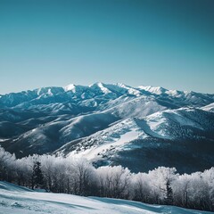 Obraz premium Serene Mountain Landscape Under Clear Blue Sky