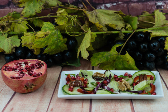 Grape leaves and grapes in the autumn lightultiple values