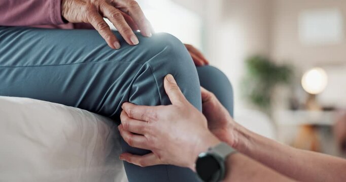 Hands, physiotherapy and old person with knee pain, medical treatment and wellness in modern office. Closeup, client and professional with healthcare, osteoporosis and massage with ache and anatomy