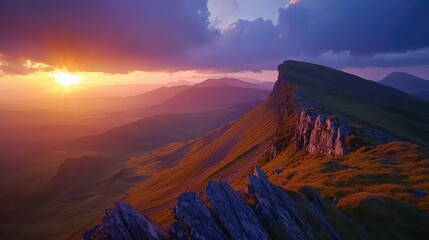 Fototapeta premium Dramatic Sunset Over Mountain Ridge with Rich Colors