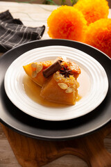 Calabaza en Tacha. Spiced Candied Pumpkin. Mexican dessert whose main ingredients are pumpkin and piloncillo, also known as Chacualole or Calabaza en dulce, widely used in Day of the Dead offerings.