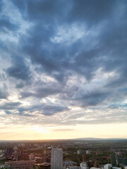 Obraz premium Aerial View of Greater Manchester City Centre and Tall Buildings During Golden Hour of Sunset, England UK. High Angle View Was Captured with Drone's Camera on the day of May 5th, 2024