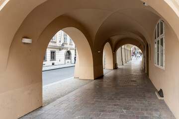 Tunnel passage under an old house on the Tomashska Street in historical part of the Prague in the Czech Republic