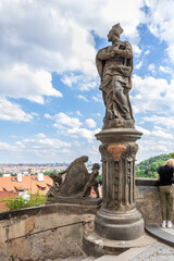 Obraz premium The statue of St Philip Neri stands on Hradcany Square next to Prague Castle and the Castle Stairs of Prague in the Czech Republic