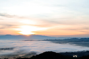 Fototapeta premium Landscape of the sea of ​​fog in the morning as the sun rises to a new day.