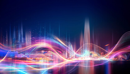 A futuristic cityscape illuminated with vibrant, abstract light trails.