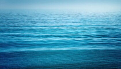 Obraz premium Calming Blue Ocean Ripple Texture. Abstract Fluid Wave Patterns in Soft Gradient Blues for Tranquil Backgrounds, Meditation Apps, and Nature Inspired Digital Designs