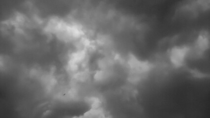 cloudy sky.A dramatic, dark, blue expanse of cloudy sky. dramatic flash. Bad weather with dark clouds. Rain And Thunderstorm In Dramatic Sky