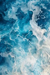 Obraz premium Abstract Deep Blue Ocean Waves with White Foam and Swirls, Capturing the Essence of Coastal Serenity and Natural Beauty in Motion