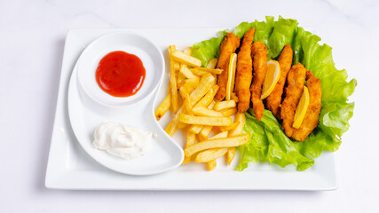 French fries and chicken strips 