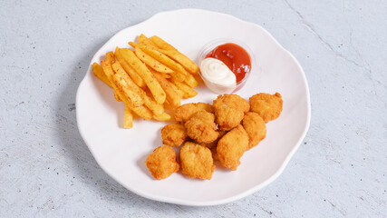 Chicken nuggets and fries