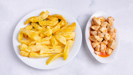 Fries and chicken goulash