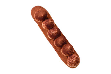 Sweet eclair with chocolate custard sprinkled with cocoa powder