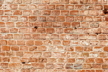 Fototapeta premium A brick wall with a white spot on it
