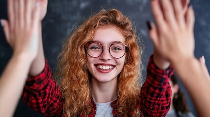 A group of young entrepreneurs celebrating the completion of their business plan with excitement and high fives, [National Write A Business Plan Month], [achievement, teamwork], ,