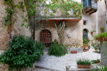 Obraz premium A street between the old houses of Alvito in Lazio, Italy. 