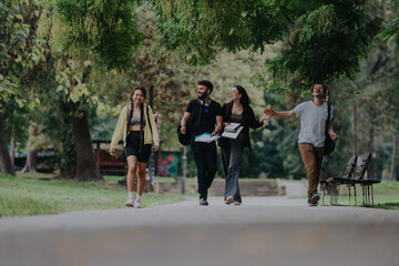 Fototapeta premium A diverse group of college students and their professor share laughs and ice cream during a leisurely break in a scenic park. The atmosphere is relaxed and joyful, showcasing camaraderie and