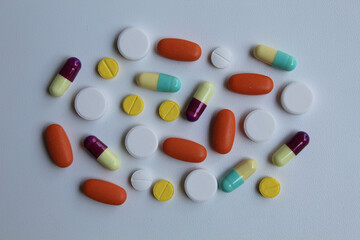 Mixed medicines on white background, flat lay or top view