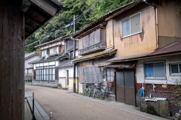Ine Fishing Village, is famous for its unique funaya, or boat houses. These wooden buildings sit right on the water and serve as both dock and home for the fishermen