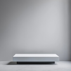 Obraz premium Sleek white rectangular podium with a minimalist design, set against a soft gray background. Ideal for displaying products in a contemporary and sophisticated style.