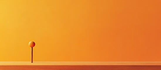 TCOY take care of yourself symbol Concept phrase TCOY take care of yourself on a wooden stick set against a lovely orange table and orange background Business concept for TCOY take care of yourself