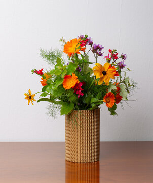 Floral arrangement with beautiful autumn flowers in a vase