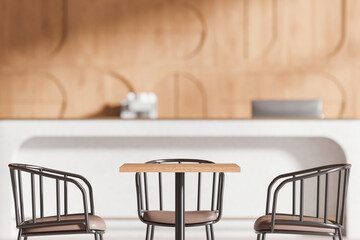 Minimalist cafe interior with table and chairs in focus. 3D Rendering