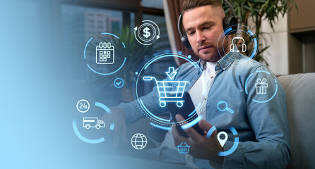 Man using smartphone with digital shopping icons overlay on blue