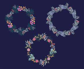 Seasonal wreath set is decorated with berries, eucalyptus, pine branch