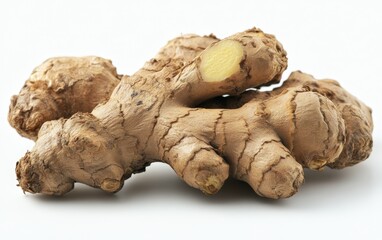 Fototapeta premium Ginger Root: A whole ginger root with its unique knobby shape, placed on a clean white background 