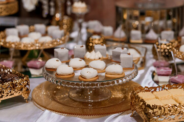 Elegant Dessert Display Featuring Assorted Confections on Ornate Platters