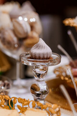 Elegant Dessert Display Featuring Exquisite Meringues and Fine Pastries