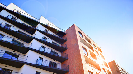 Modern multifamily building in a european city.  Walls made of concrete. Luxury house complex.