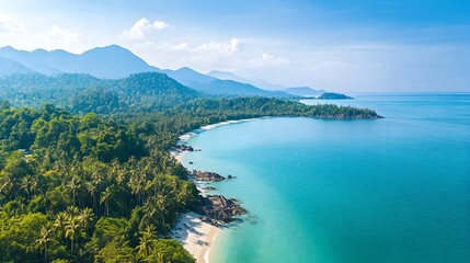 Obraz premium Stunning Aerial View of Lush Tropical Island with Turquoise Waters and Pristine Beaches