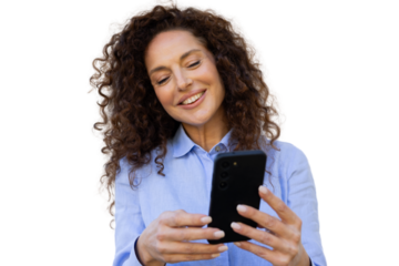 Happy Latina businesswoman texting on her smartphone