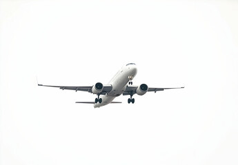Obraz premium White Airplane Flying Against Clear Sky Background