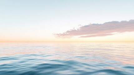 Obraz premium A calm ocean scene at dawn, with the sky and water merging in subtle hues of soft peach, pale blue, and creamy white