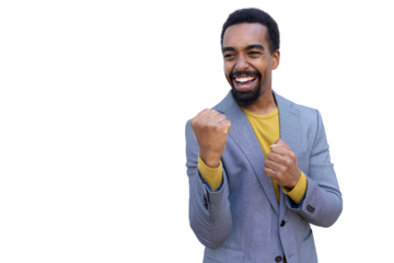 Young Black businessman cheering with clenched fists