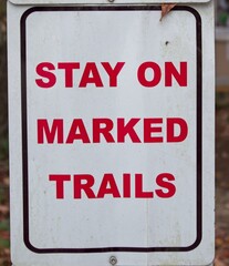 Stay on Marked Trails sign in a public park