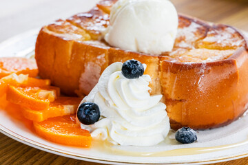 honey toast with cream, orange, berry and homemade ice cream