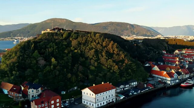 showcases aerial view leading Mount wooden buildings emphasizing charm picturesque coastal