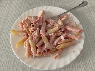 Pasta with cottage cheese in a plate