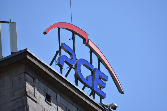 PGE Polska Grupa Energetyczna. Polish state-owned electric power distribution company. Signage, logo on the facade. WARSAW, POLAND - MAY 21, 2023