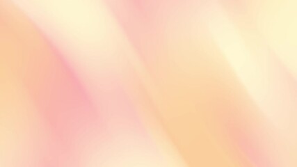 Blurred background, light pink and yellow hues. 
