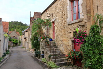 typical streets with old houses in Noyers sur Serein, France, Europe