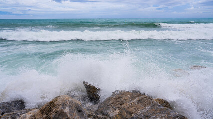Sea waves crashing onto the rocks 4