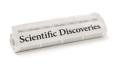 Rolled newspaper with the headline Scientific Discoveries