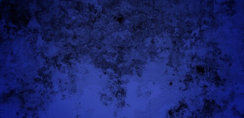 long background of cracked wall blue color. blue wall texture background marked by long exposure to the elements outdoors and painting peeling off.