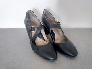 Elegant Black Leather Womens Shoes with a Stylish Strap and Buckle for Formal Occasions and Events